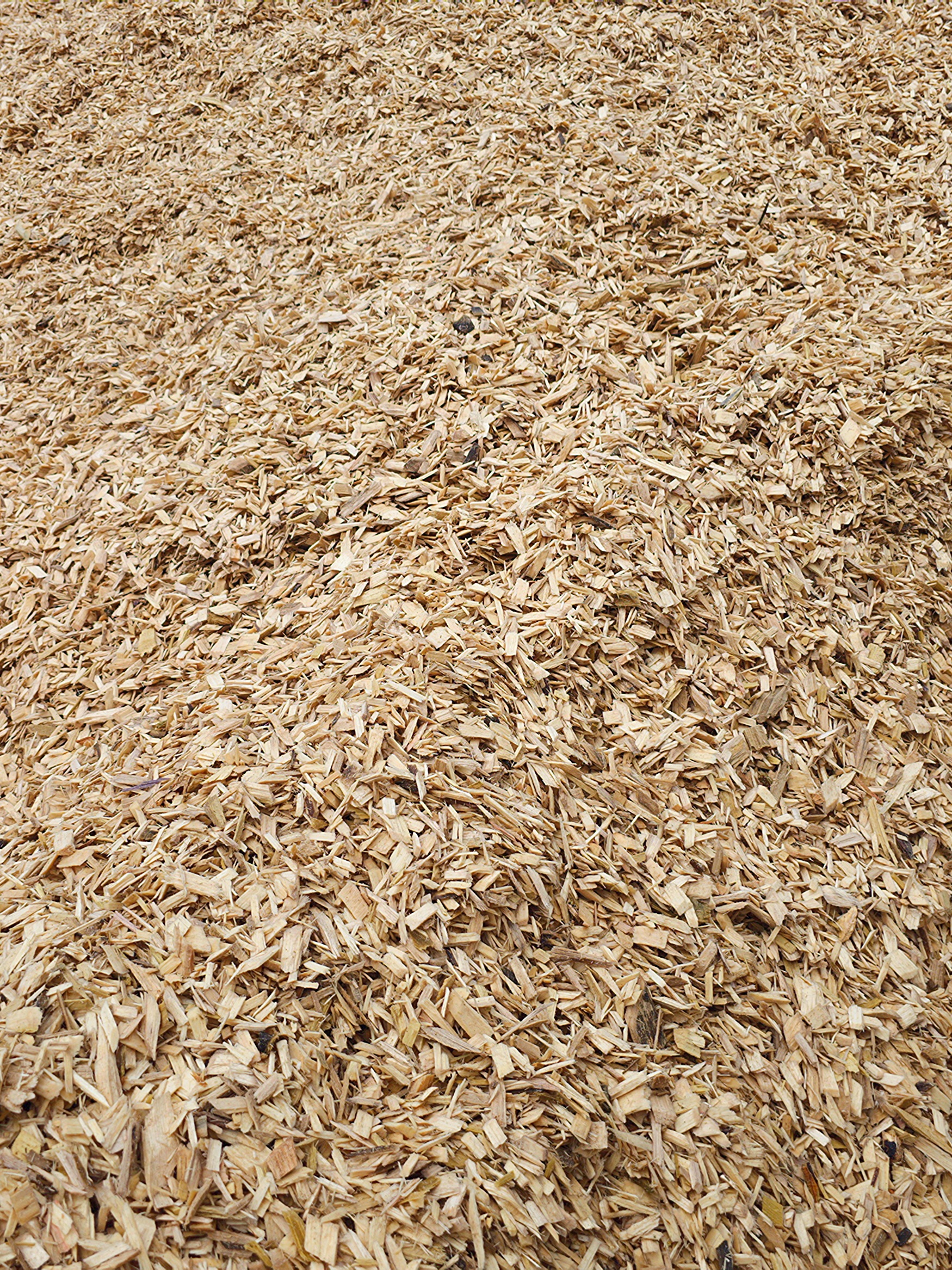 turman-forest-products-hardwood-chips-mulch Pile of hardwood chips produced at Turman Forest Products sawmill in Virginia, repurposed for mulch, pellets, and sustainable byproduct markets.