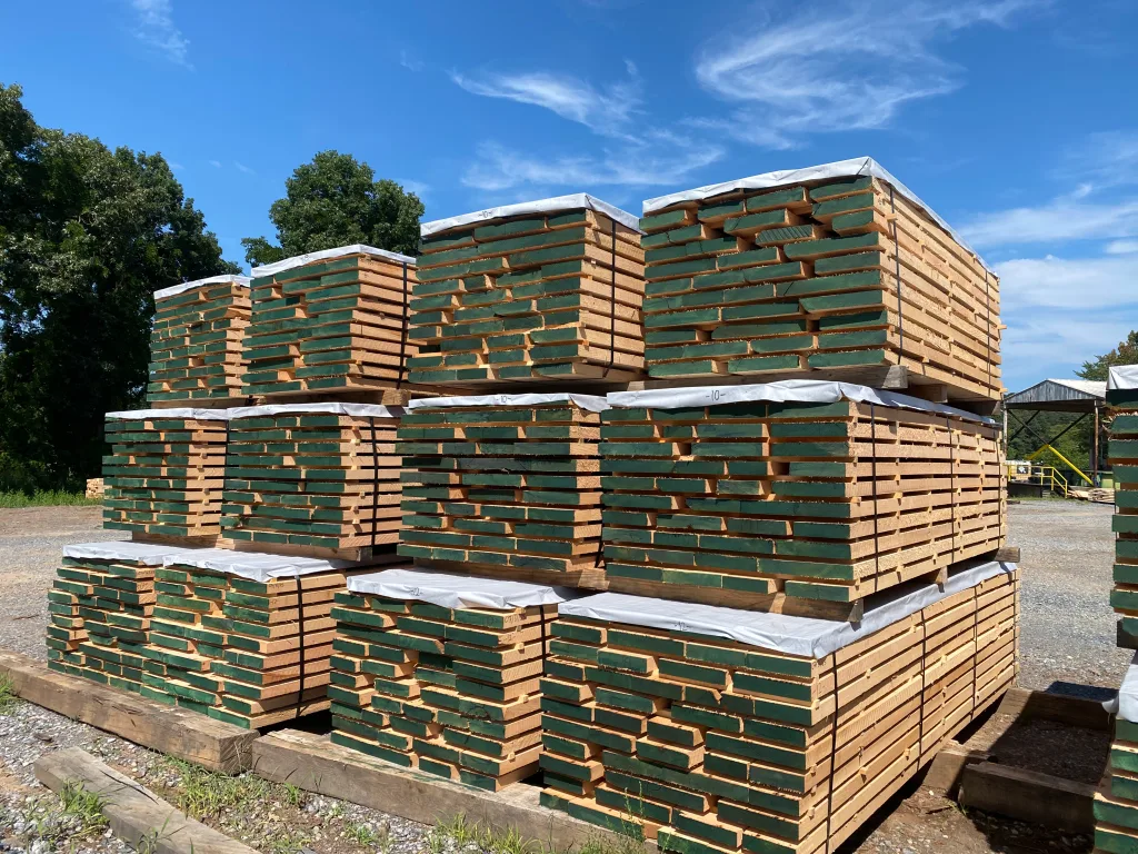 Stacks of ship dry Appalachian hardwood lumber wrapped and stored for export at Turman Forest Products yard in Virginia.